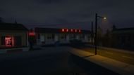 There's a drop hidden behind the Motel in Schedule 1 (Image via TVGS)